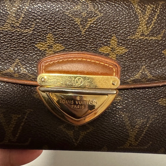 LOUIS VUITTON
Monogram Canvas Eugenie Wallet USED - Picture 8 of 8
